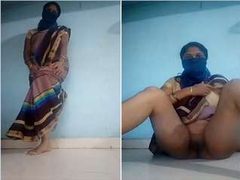Indian milf hides her face but spreads legs and masturbates right on the floor