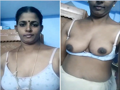 Another exclusive video of a Desi woman with juicy boobs masturbating for XXX