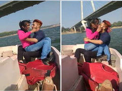 Desi teen with a great figure is romantic on a boat while someone is filming XXX
