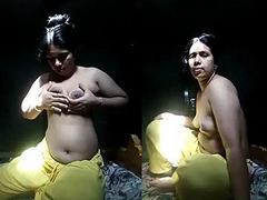 Super hot XXX show by a busty Desi brunette taking off her dress and teasing