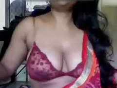 Full XXX show by a Desi cougar as she is slowly removing her clothes and bra