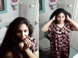 Super Cute Desi girl is playing with her small tits while in the bathroom XXX