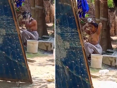 Voyeuristic Desi Girl Outdoor Bath Caught On Hidden Cam – Neighbor Takes Peek At Her Nude Body